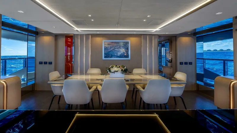 Neverland Yacht Photos Pics Luxurious dining area on 2016 Mangusta Oceano 42 yacht with ocean views.