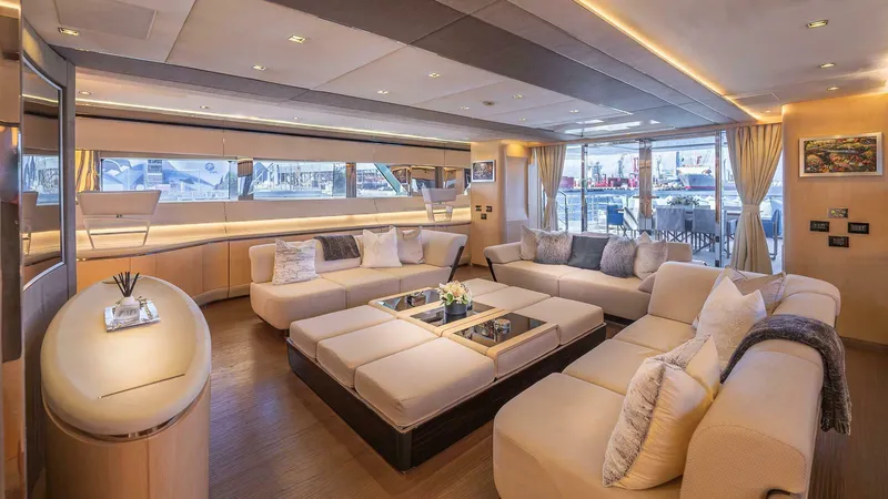Neverland Yacht Photos Pics Luxurious interior of 2016 Mangusta Oceano 42 yacht with elegant seating and modern decor.