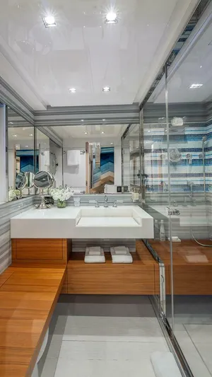Neverland Yacht Photos Pics Luxurious bathroom interior on 2016 Mangusta Oceano 42 yacht, featuring modern design and elegant fixtures.