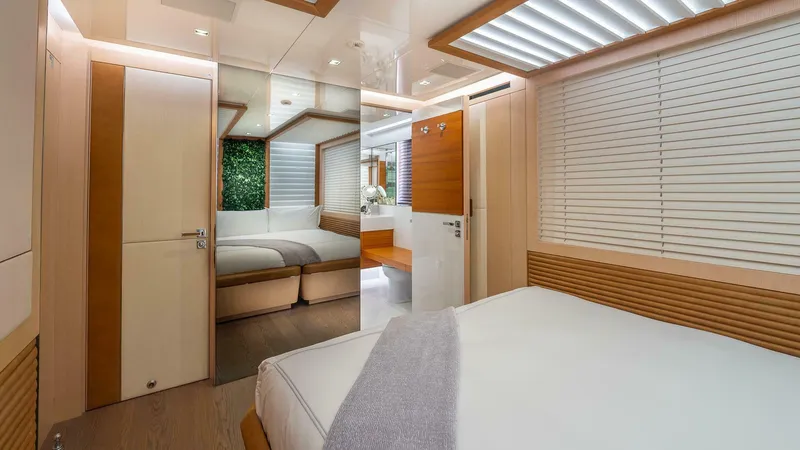 Neverland Yacht Photos Pics Luxurious interior of 2016 Mangusta Oceano 42 yacht with modern bedroom design.