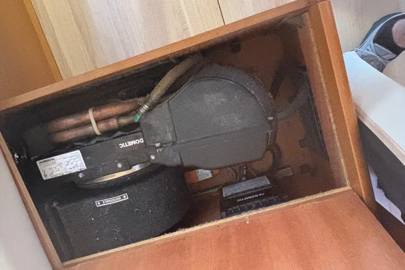 Eclipse Yacht Photos Pics 2018 Jeanneau Sun Odyssey 389 interior showing mechanical components and piping.