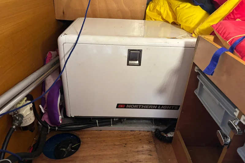 Eclipse Yacht Photos Pics Northern Lights generator inside 2018 Jeanneau Sun Odyssey 389 yacht cabin.