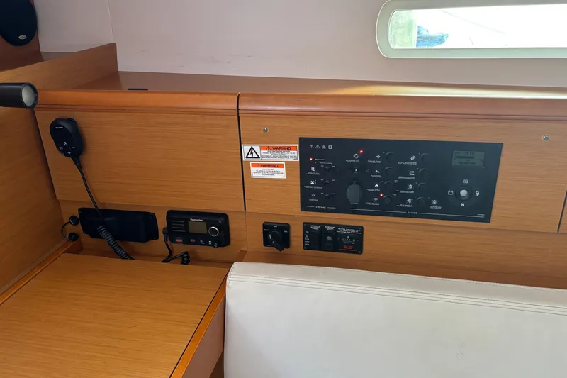 Eclipse Yacht Photos Pics Control panel of a 2018 Jeanneau Sun Odyssey 389 sailboat interior.