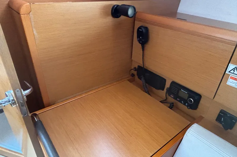Eclipse Yacht Photos Pics Navigation station on 2018 Jeanneau Sun Odyssey 389 yacht with communication equipment.