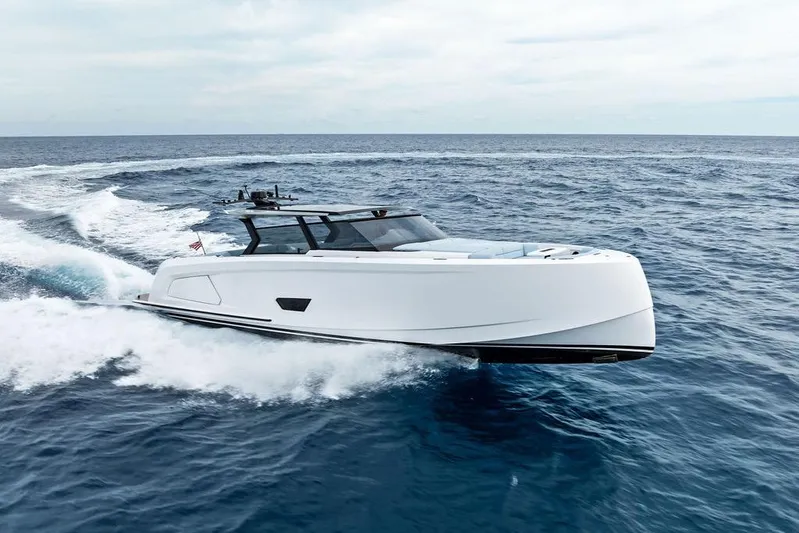 Shir Yacht Photos Pics 2024 Vanquish VQ58 yacht cruising on open ocean waters.