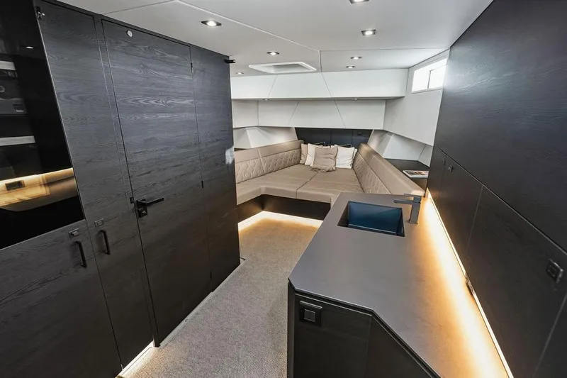 Shir Yacht Photos Pics Luxurious interior of 2024 Vanquish VQ58 yacht with modern design and ambient lighting.
