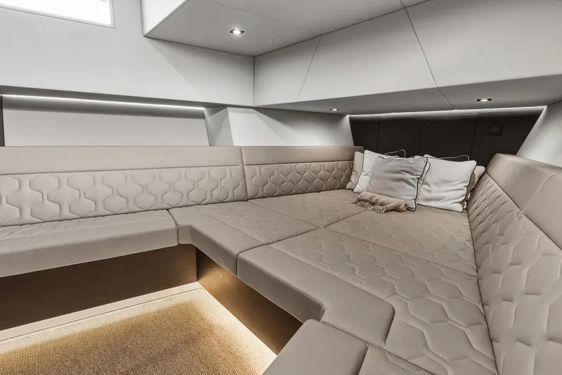 Shir Yacht Photos Pics Luxurious interior of 2024 Vanquish VQ58 yacht with elegant beige seating.