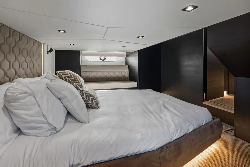 Shir Yacht Photos Pics Luxurious interior of 2024 Vanquish VQ58 yacht with elegant bedding and modern design.