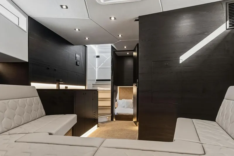 Shir Yacht Photos Pics Luxurious interior of 2024 Vanquish VQ58 yacht with modern design and elegant furnishings.