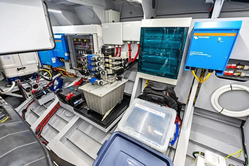Shir Yacht Photos Pics Engine room of 2024 Vanquish VQ58 yacht, showcasing advanced electrical systems and components.