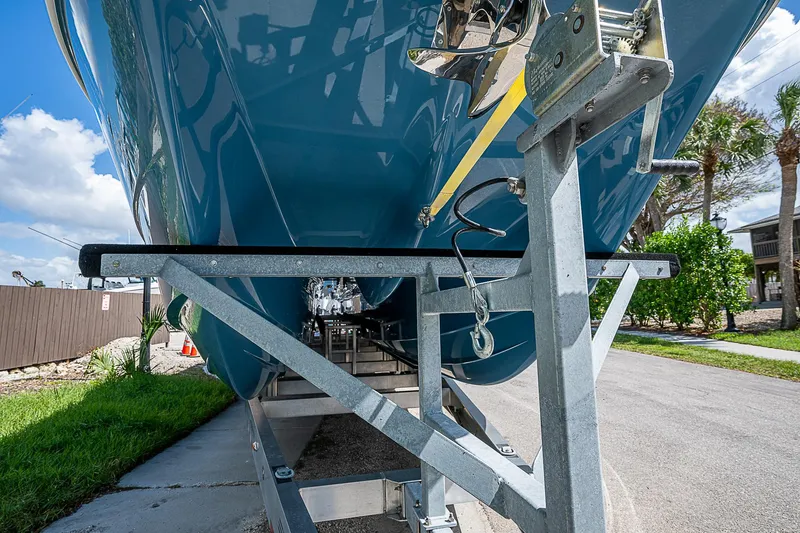  Yacht Photos Pics 2025 Invincible 38 Catamaran on trailer, showcasing sleek hull design and sturdy construction.