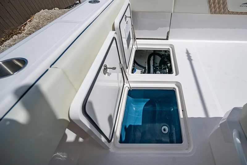  Yacht Photos Pics 2025 Invincible 38 Catamaran storage compartments and livewell on deck.