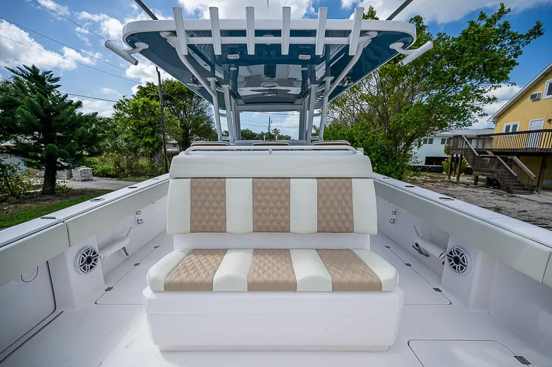  Yacht Photos Pics 2025 Invincible 38 Catamaran with spacious seating and modern design.