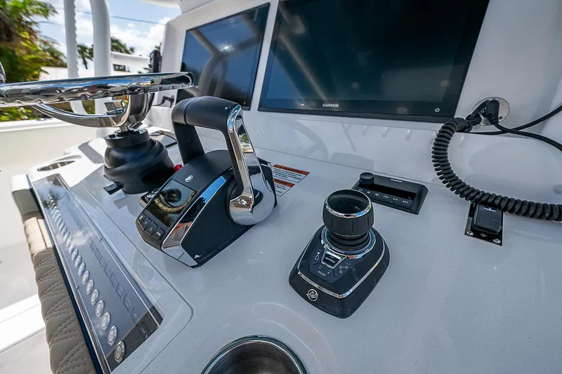 Yacht Photos Pics Control panel of 2025 Invincible 38 Catamaran with modern navigation equipment.