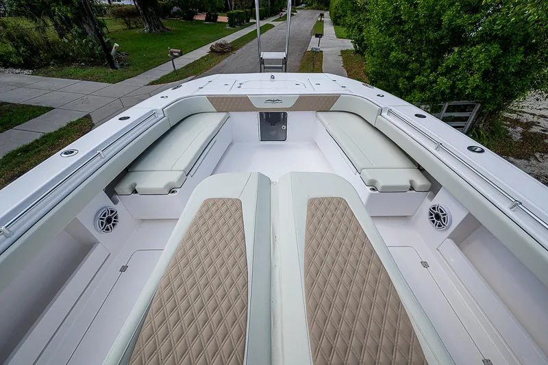  Yacht Photos Pics 2025 Invincible 38 Catamaran with spacious seating and modern design.