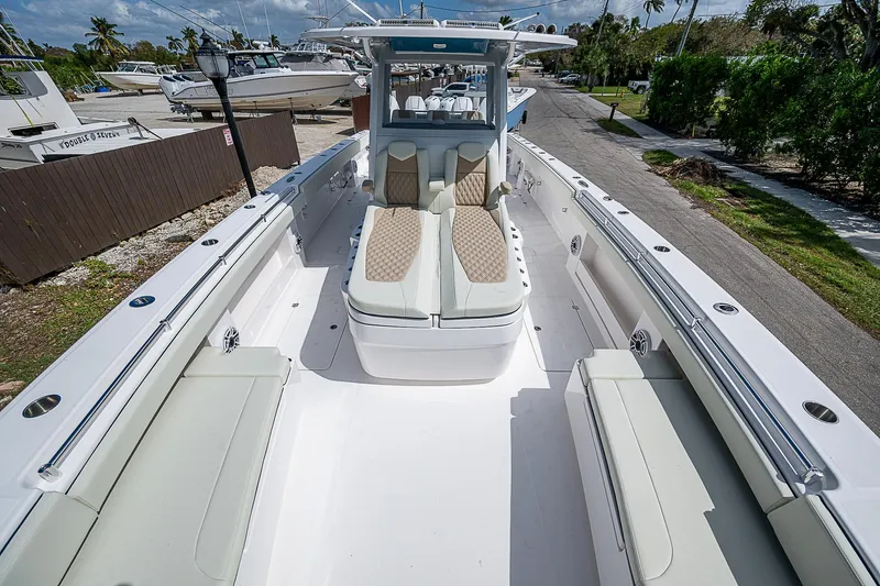  Yacht Photos Pics 2025 Invincible 38 Catamaran with spacious seating and sleek design.