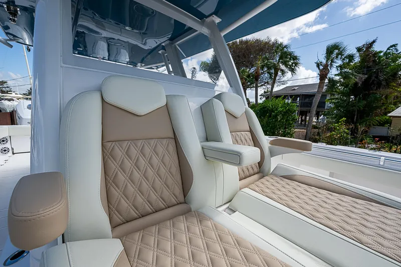 Yacht Photos Pics Luxurious seating on 2025 Invincible 38 Catamaran with diamond-stitched upholstery.