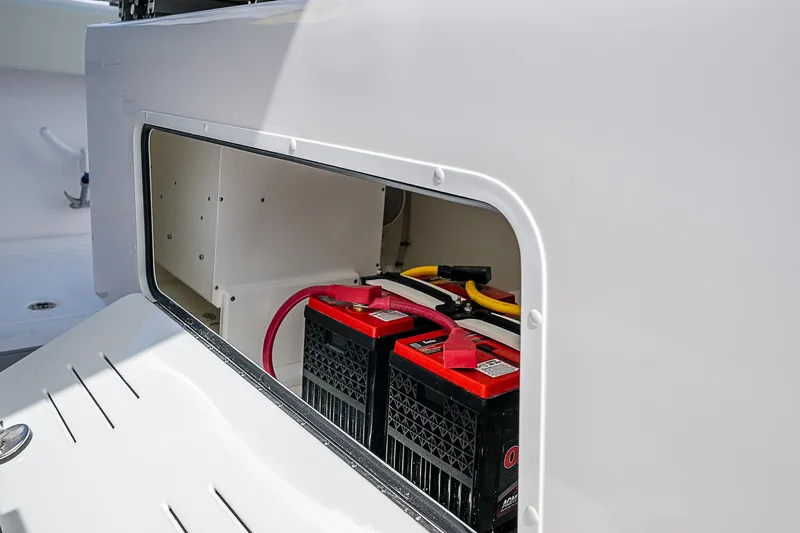  Yacht Photos Pics Battery compartment of 2025 Invincible 38 Catamaran, featuring dual marine batteries.
