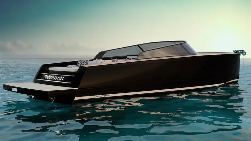  Yacht Photos Pics 2025 VanDutch 56 luxury yacht on calm ocean waters at sunset.