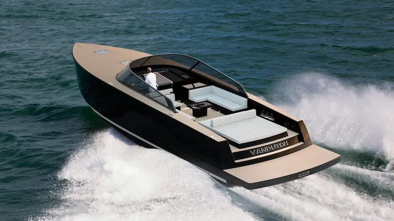  Yacht Photos Pics 2025 VanDutch 56 luxury yacht cruising on open water.