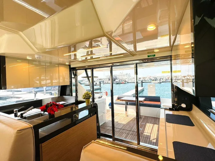  Yacht Photos Pics Interior of 2015 Ferretti Yachts 550, featuring modern design and marina view.