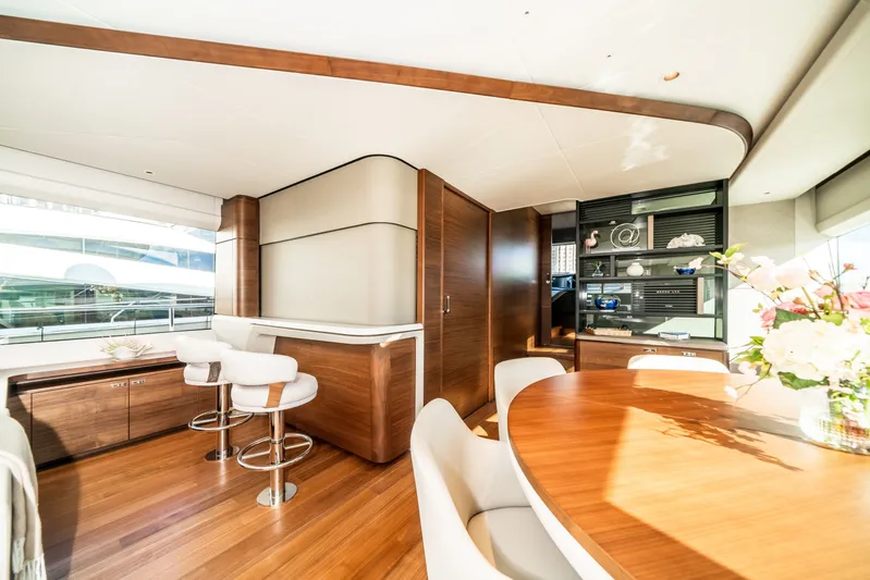 Record Year Yacht Photos Pics Luxurious interior of 2021 Princess Y85 Motor Yacht with elegant wood finishes and modern decor.