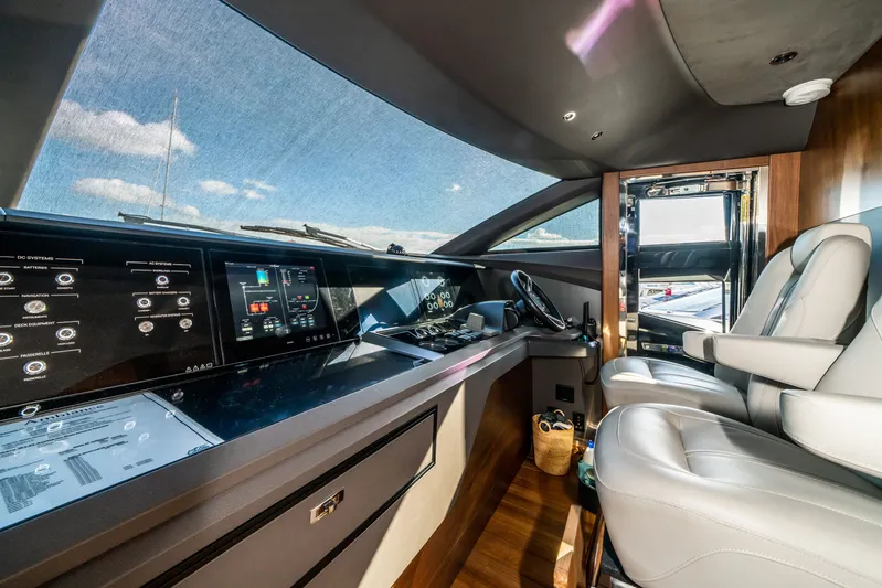 Record Year Yacht Photos Pics Luxurious 2021 Princess Y85 Motor Yacht cockpit with advanced navigation systems and plush seating.