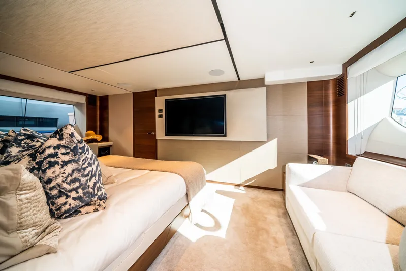 Record Year Yacht Photos Pics Luxurious interior of 2021 Princess Y85 Motor Yacht with modern decor and large TV.