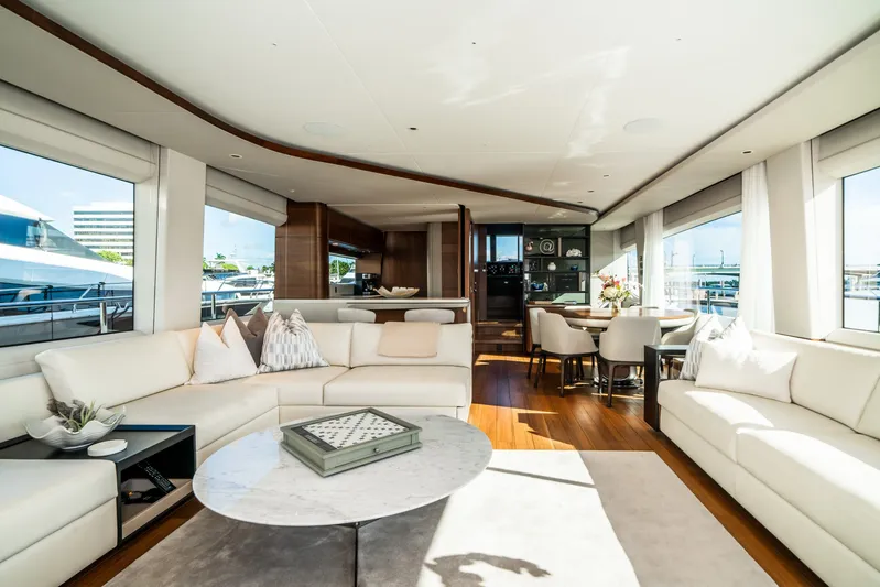 Record Year Yacht Photos Pics Luxurious interior of 2021 Princess Y85 Motor Yacht with elegant seating and dining area.