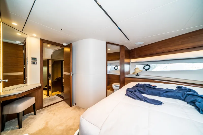 Record Year Yacht Photos Pics Luxurious bedroom interior of 2021 Princess Y85 Motor Yacht with modern design and elegant furnishings.