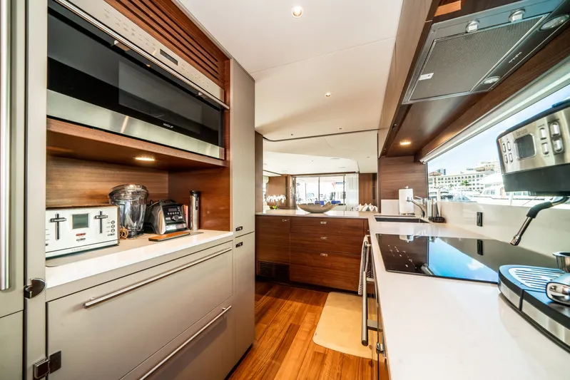Record Year Yacht Photos Pics Luxurious kitchen interior of 2021 Princess Y85 Motor Yacht with modern appliances.