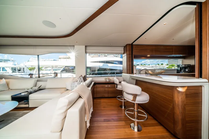 Record Year Yacht Photos Pics Luxurious interior of 2021 Princess Y85 Motor Yacht with elegant seating and modern kitchen area.