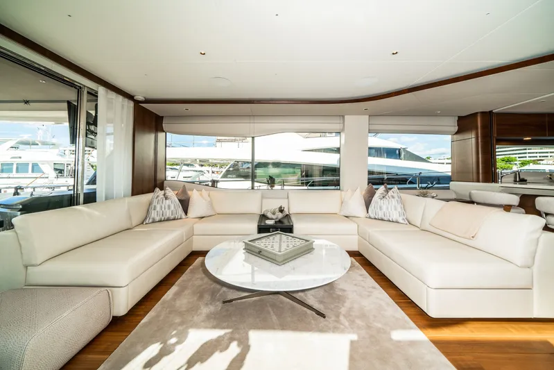 Record Year Yacht Photos Pics Luxurious interior of 2021 Princess Y85 Motor Yacht with elegant white seating and modern decor.
