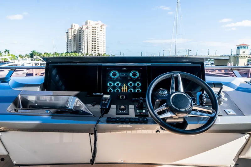 Record Year Yacht Photos Pics Helm of 2021 Princess Y85 Motor Yacht with modern controls and steering wheel.