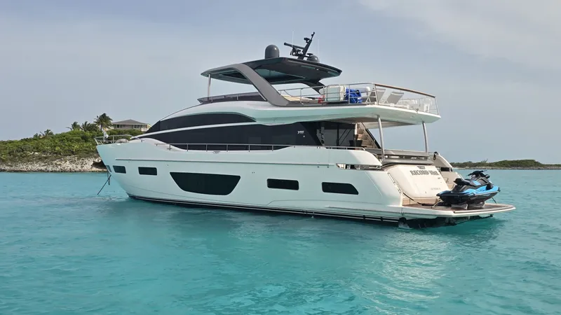 Record Year Yacht Photos Pics 2021 Princess Y85 Motor Yacht anchored in clear turquoise waters.
