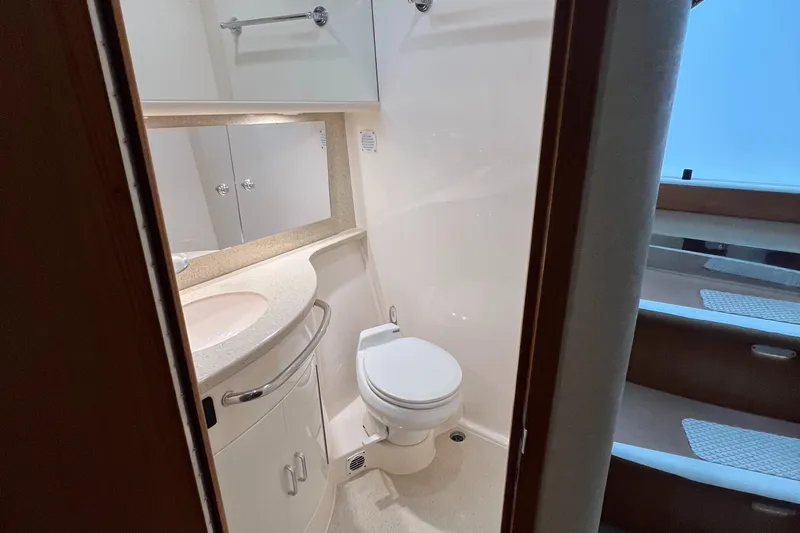 Pacific Adventures Yacht Photos Pics 2008 Cabo 52 Express yacht bathroom with modern fixtures and compact design.