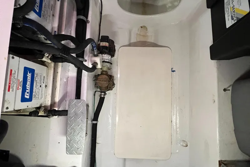 Pacific Adventures Yacht Photos Pics 2008 Cabo 52 Express engine room with wiring and components.