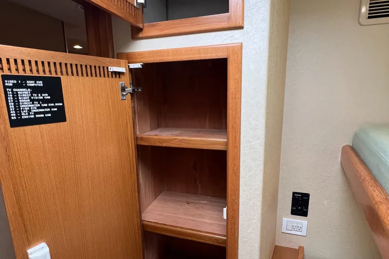 Pacific Adventures Yacht Photos Pics Wooden cabinet interior on a 2008 Cabo 52 Express boat.