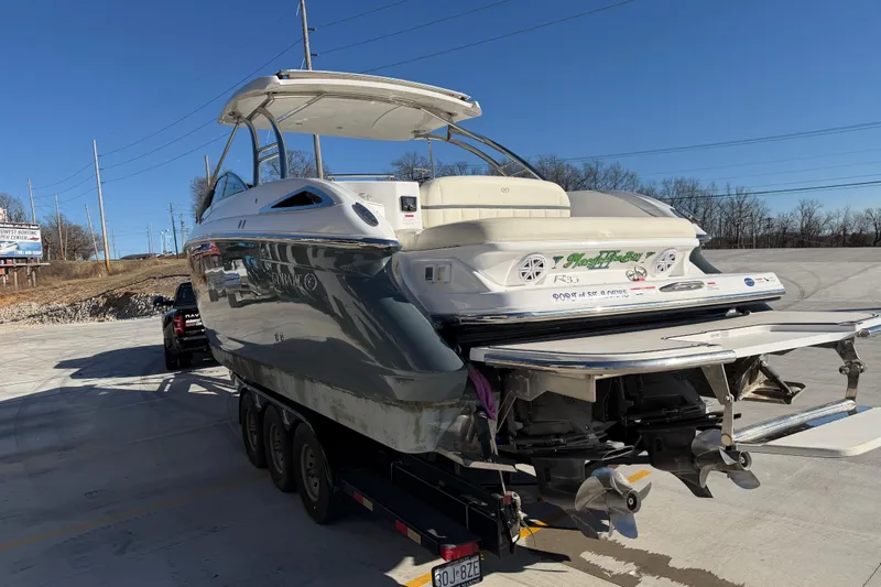  Yacht Photos Pics 2019 Cobalt R35 boat on trailer, sunny day, outdoor setting.