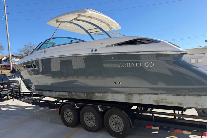  Yacht Photos Pics 2019 Cobalt R35 boat on trailer, sleek design, parked outdoors.