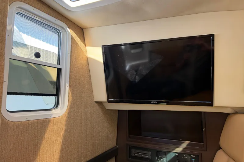  Yacht Photos Pics Interior of 2019 Cobalt R35 boat with TV and window.