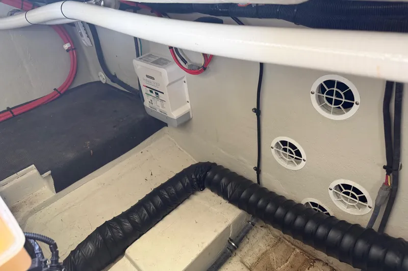  Yacht Photos Pics Interior of a 2019 Cobalt R35 boat showing wiring and ventilation system.