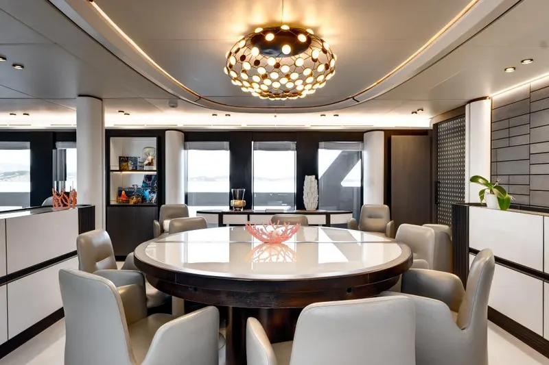 L.a.u.l Yacht Photos Pics Luxurious dining area on 2019 ISA Extra 130 yacht with elegant decor and modern lighting.