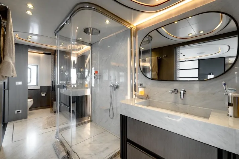L.a.u.l Yacht Photos Pics Luxurious bathroom in 2019 ISA Extra 130 yacht with modern fixtures and elegant design.