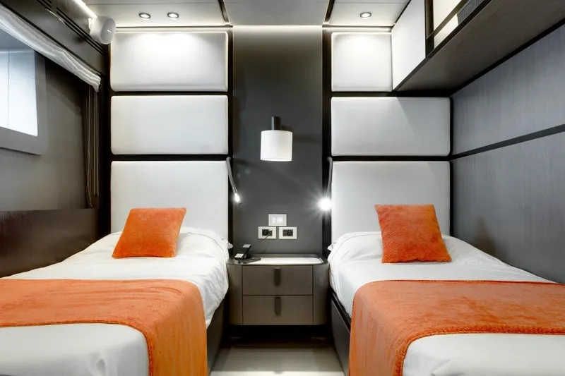 L.a.u.l Yacht Photos Pics Modern twin bedroom with orange accents in 2019 ISA Extra 130 yacht.