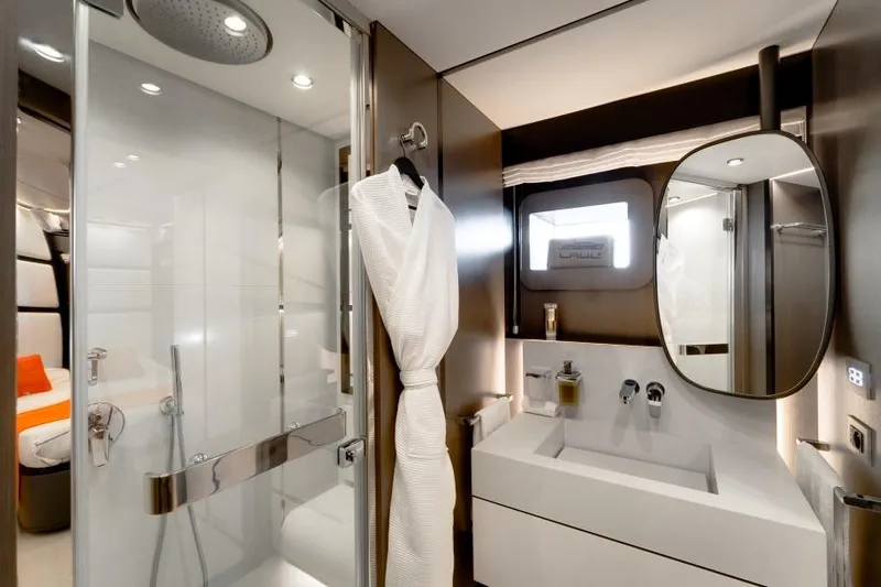 L.a.u.l Yacht Photos Pics Luxurious bathroom in 2019 ISA Extra 130 yacht, featuring modern fixtures and elegant design.