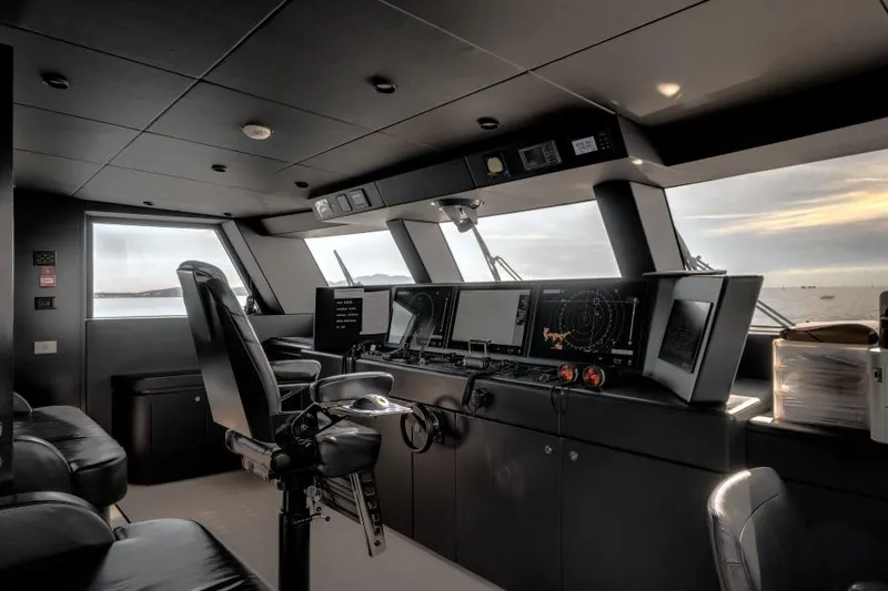 L.a.u.l Yacht Photos Pics Modern yacht cockpit interior of 2019 ISA Extra 130, featuring advanced navigation systems.