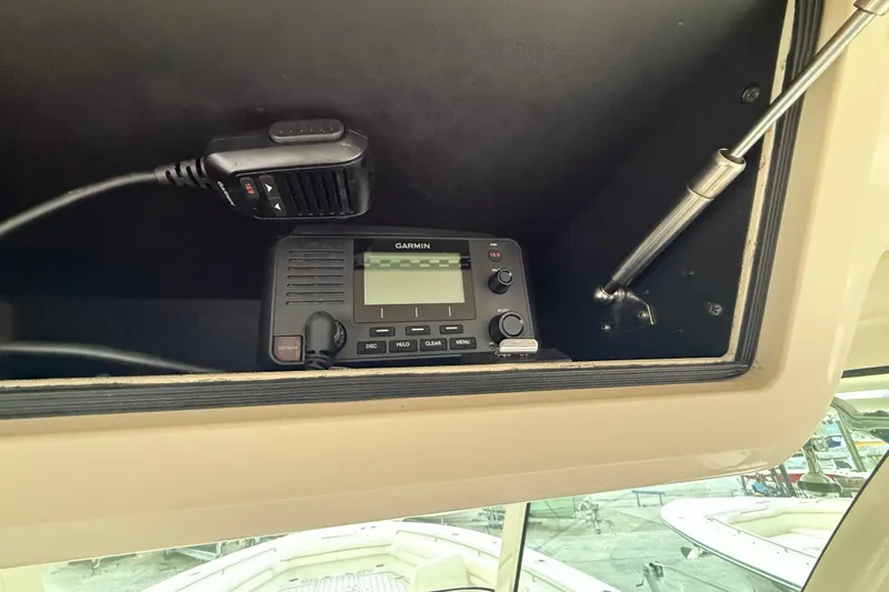 376-420 Brokerage Tyler Yacht Photos Pics 2020 Grady-White Canyon 376 boat with Garmin marine radio installed in the console.