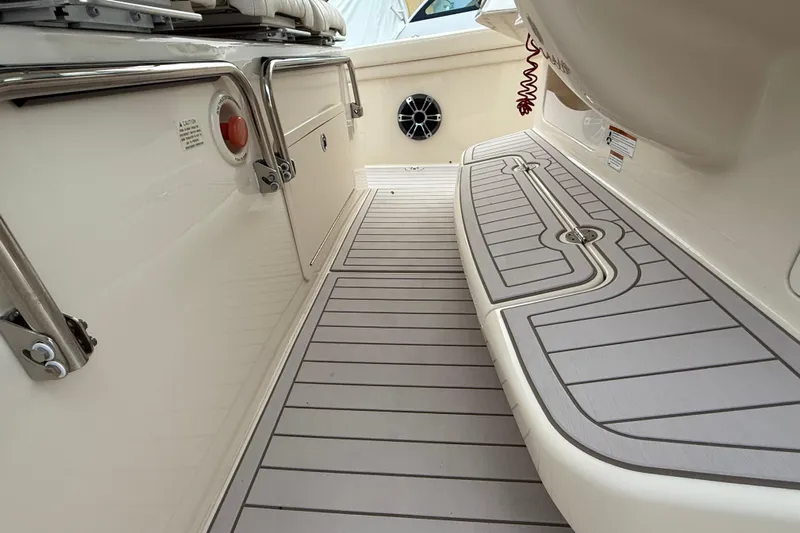 376-420 Brokerage Tyler Yacht Photos Pics 2020 Grady-White Canyon 376 boat deck with sleek design and storage compartments.