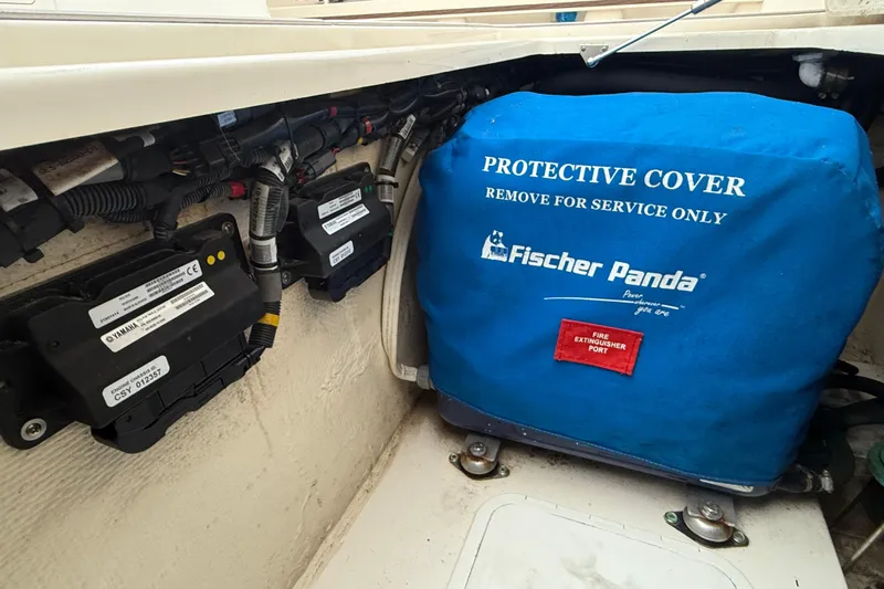 376-420 Brokerage Tyler Yacht Photos Pics 2020 Grady-White Canyon 376 boat engine compartment with Fischer Panda protective cover.